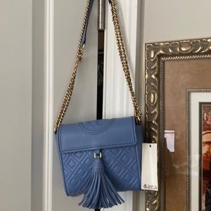 Tory Burch mini shoulder / cross body hand bag.